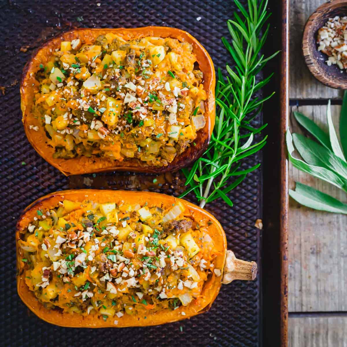 Roasted honeynut squash stuffed with an easy ground meat and rosemary flavored filling.