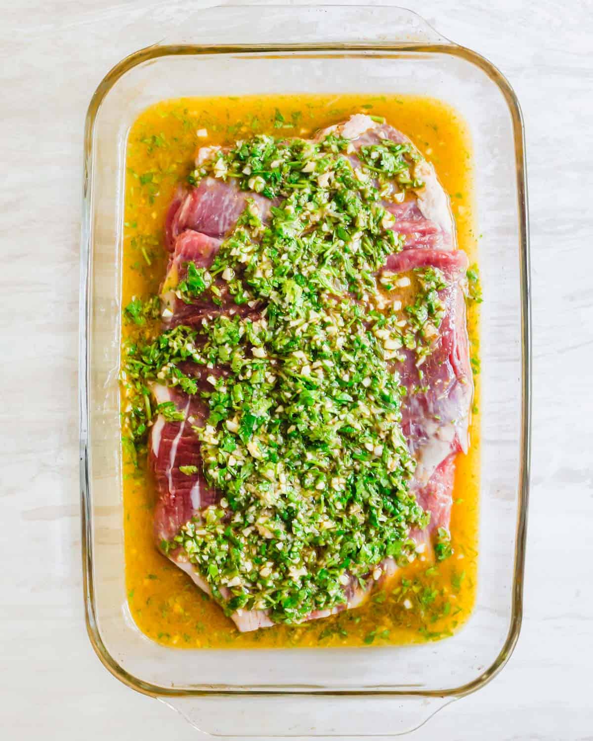 Carne asada flank steak marinating.