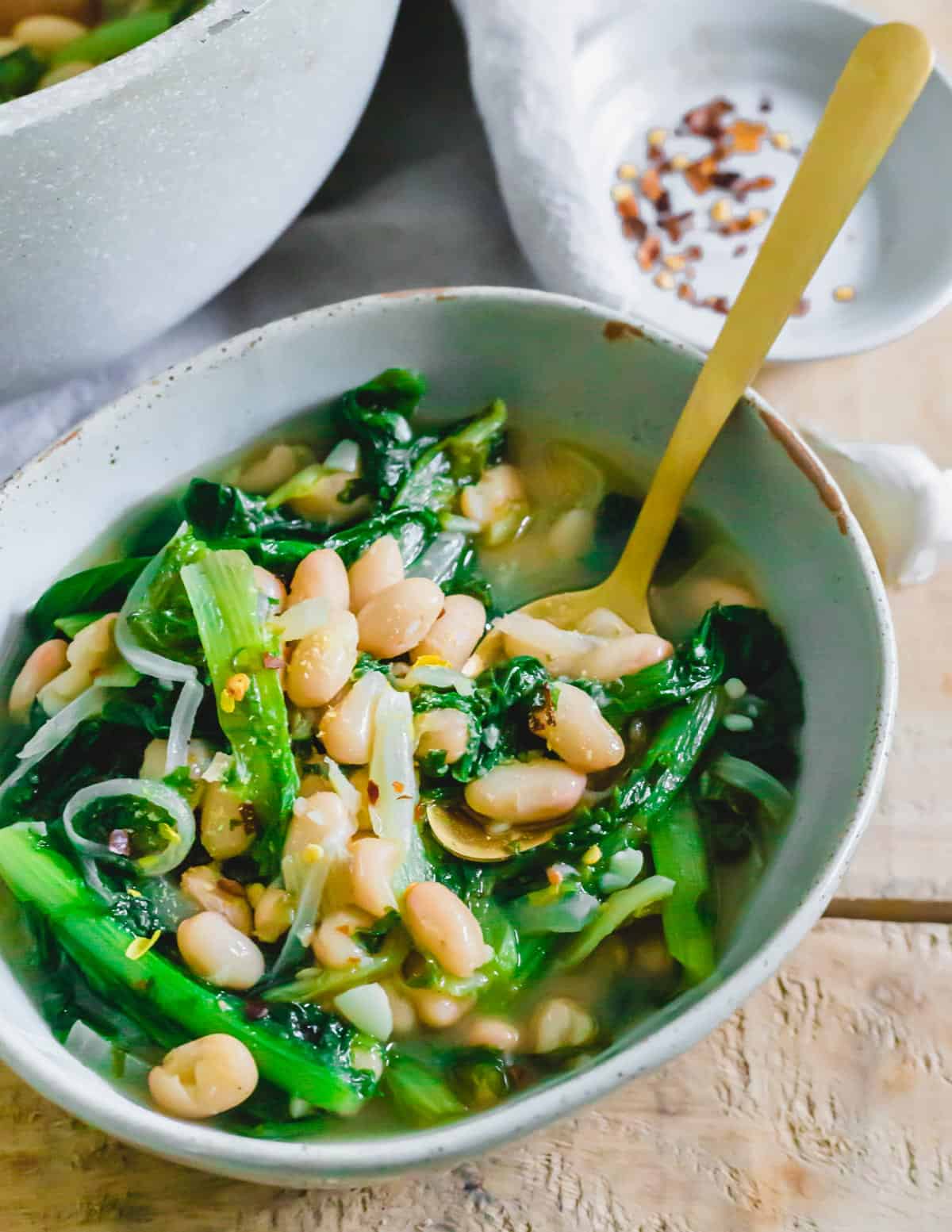 Escarole and beans is a classic Italian recipe that makes delicious use of simple vegetarian ingredients to create a hearty and cozy dish.