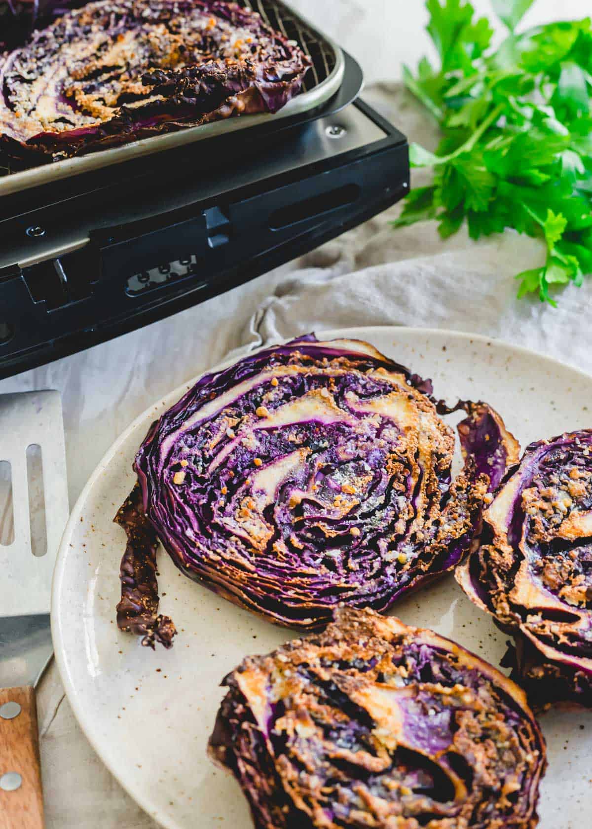 Red cabbage steaks cooked in the air fryer.