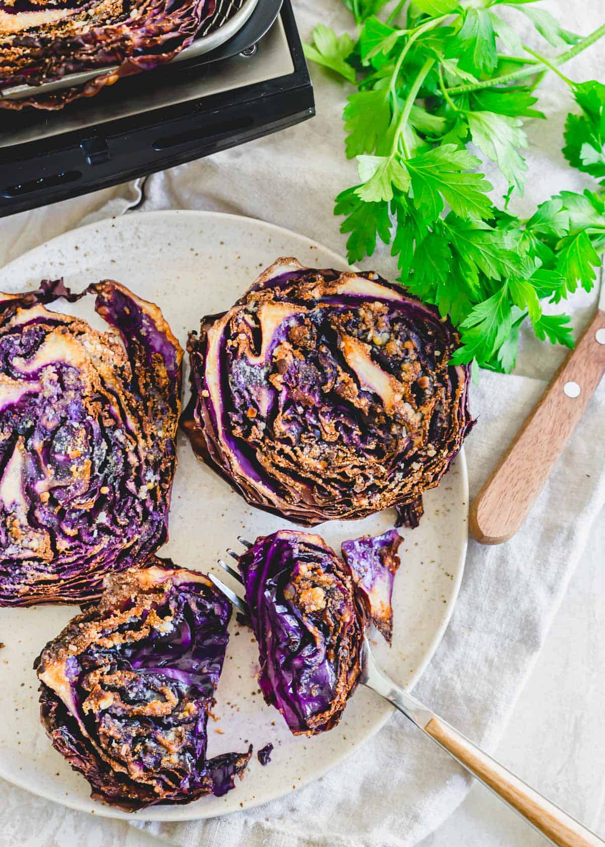 Easy air fryer cabbage recipe with garlic, onion and salt.