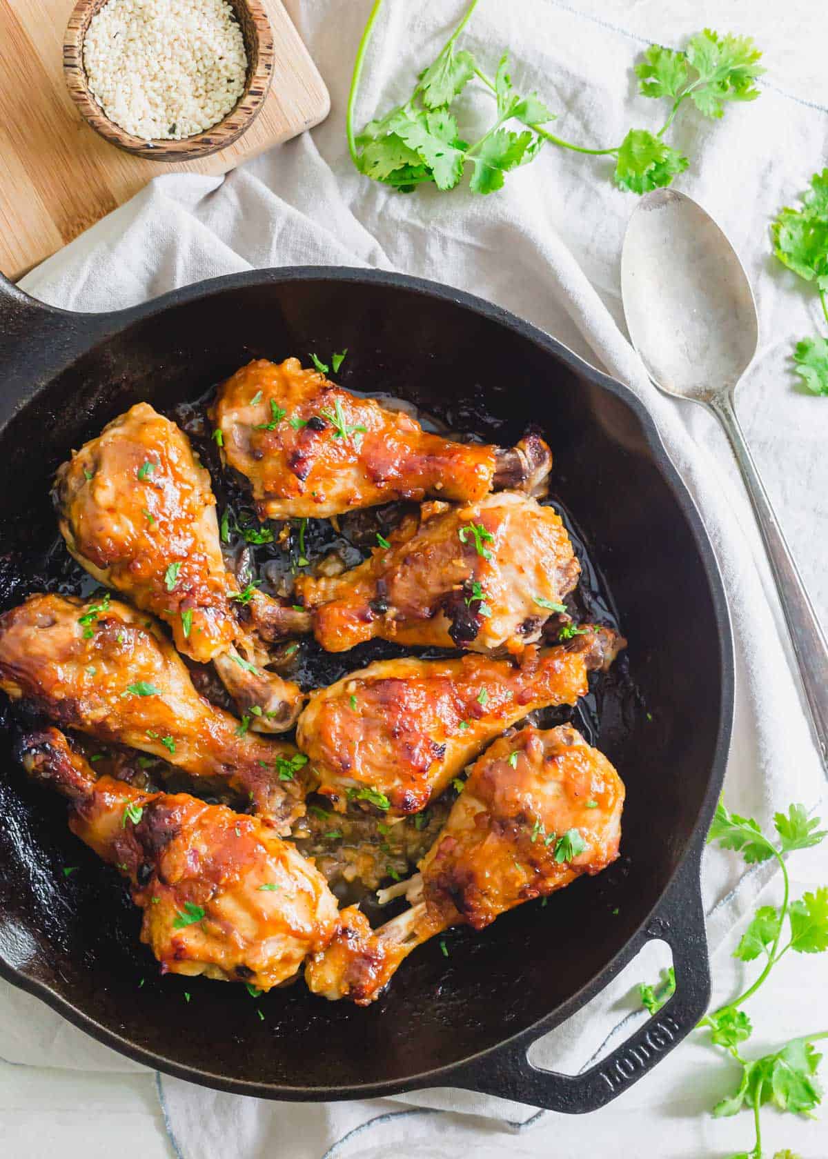 Baked miso chicken recipe garnished with cilantro.