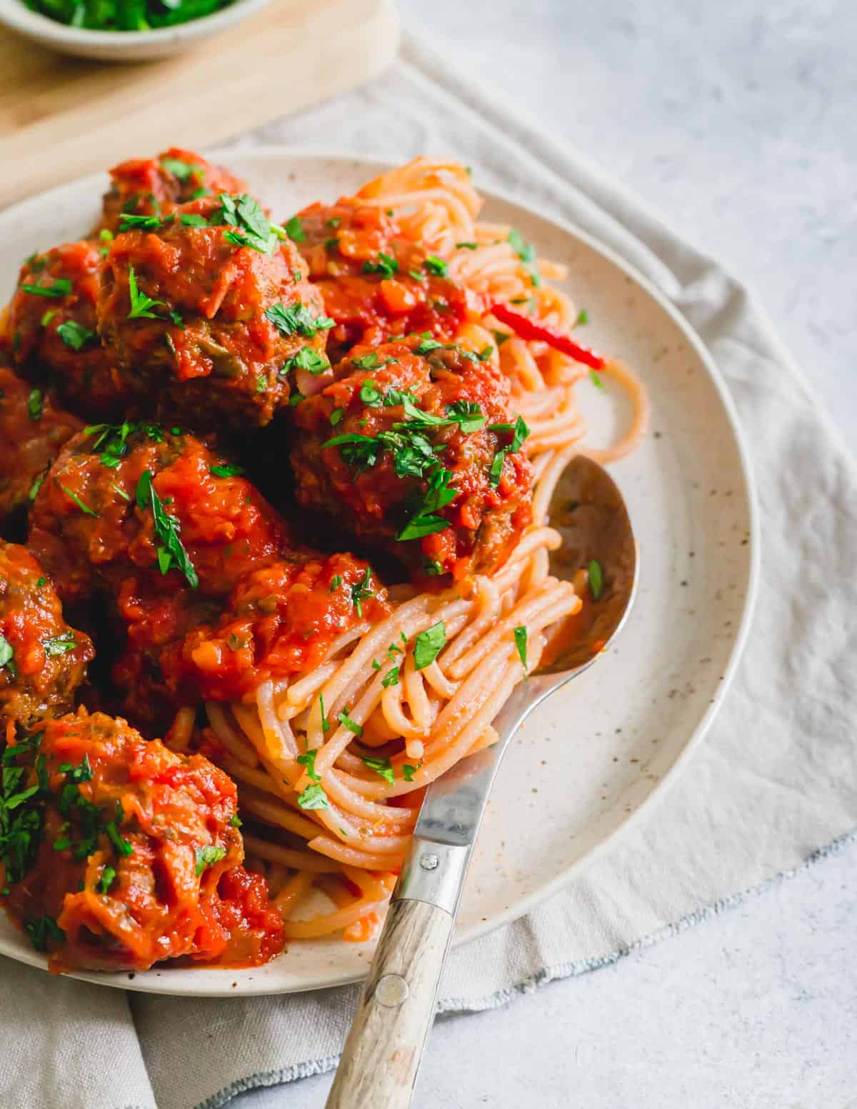 Tender, moist venison meatball recipe served with spaghetti.