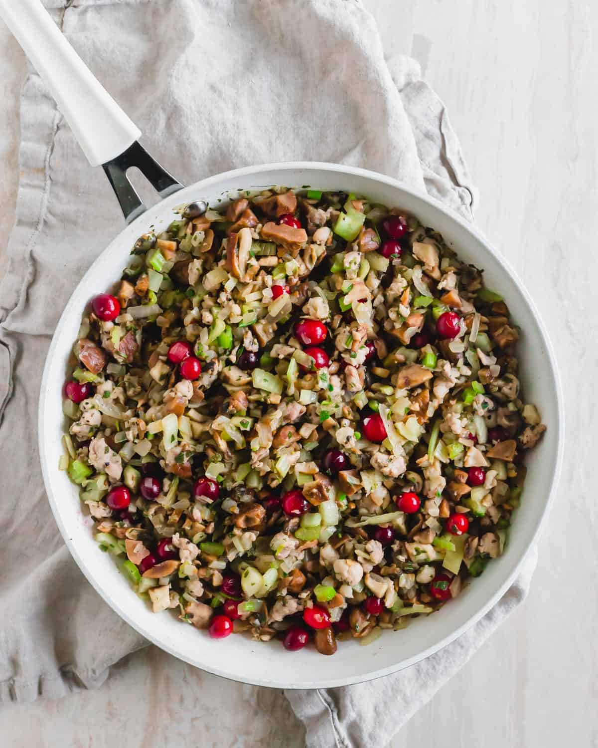 Cooking the chestnut stuffing in a skille.