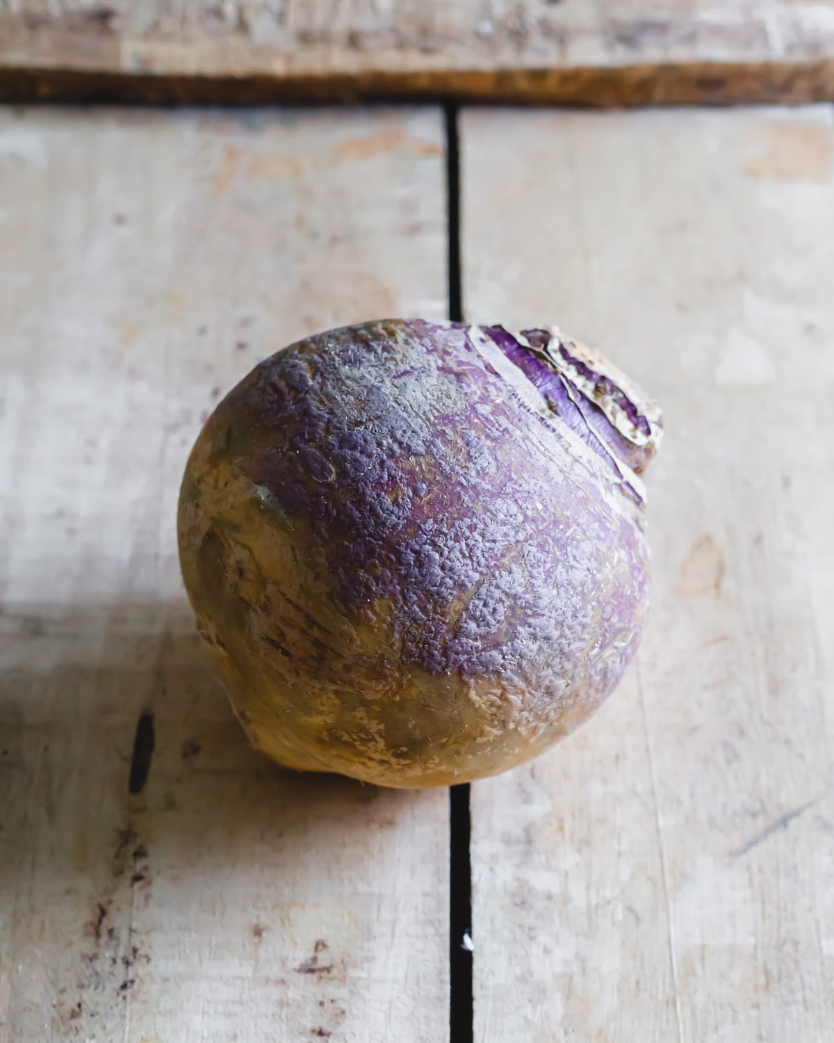 Rutabaga on a wooden board.