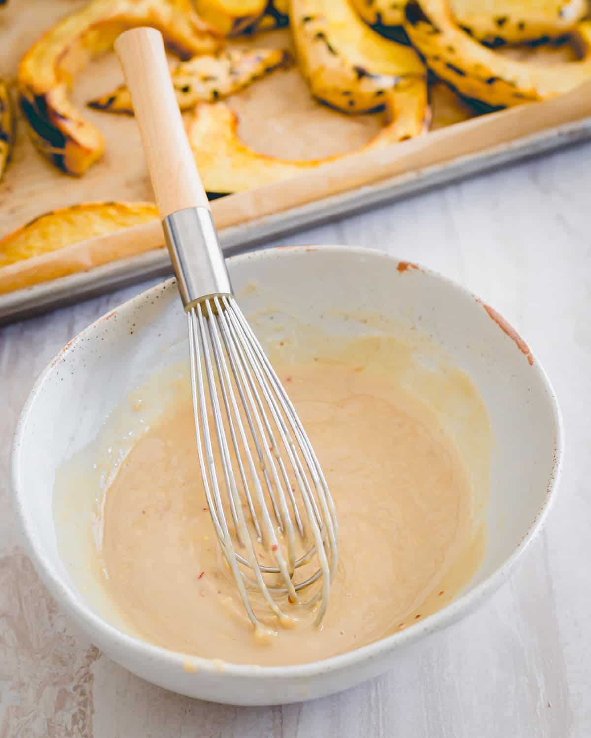 Maple dijon tahini sauce to serve with roasted sweet dumpling squash.