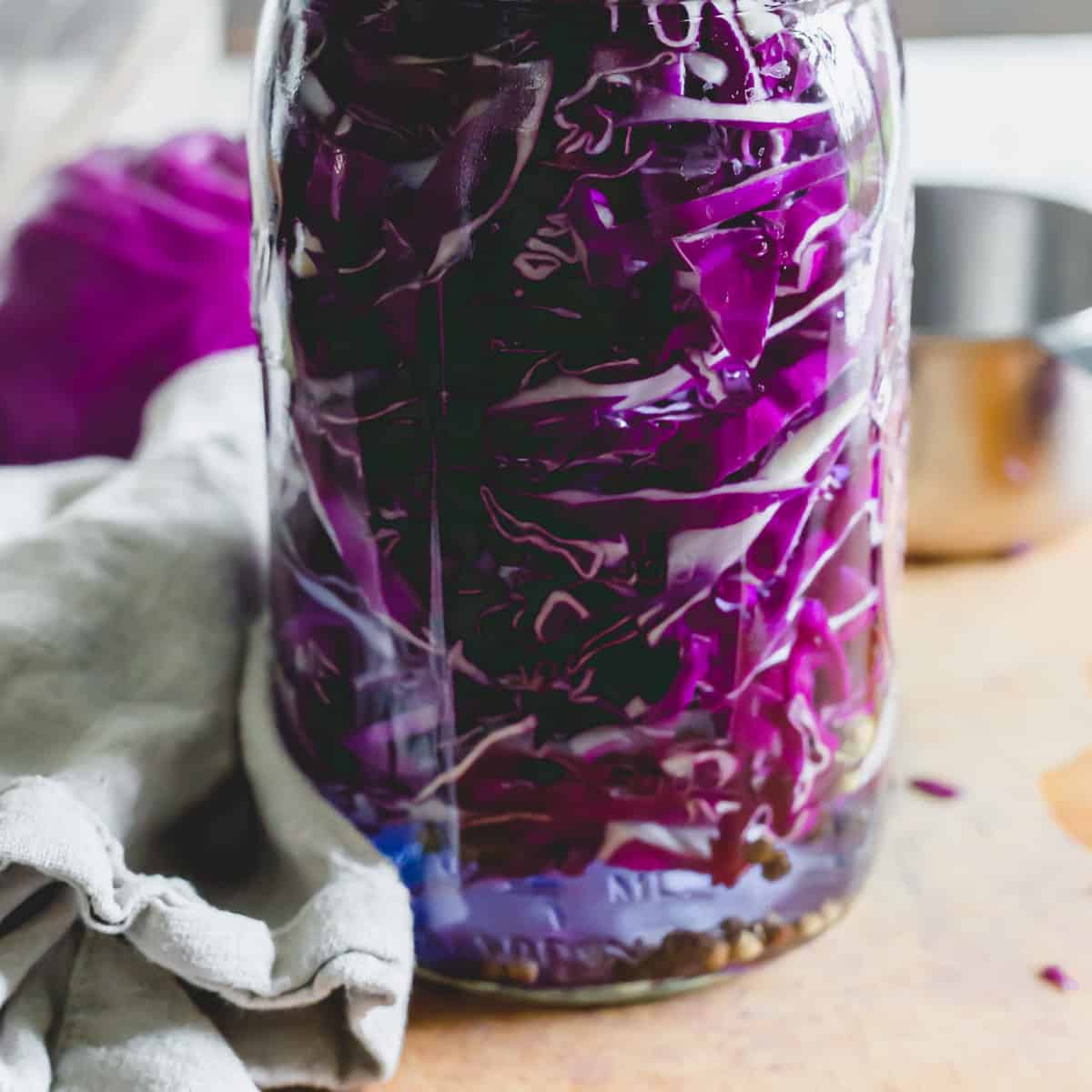 Day 1 of fermented red cabbage in a mason jar.