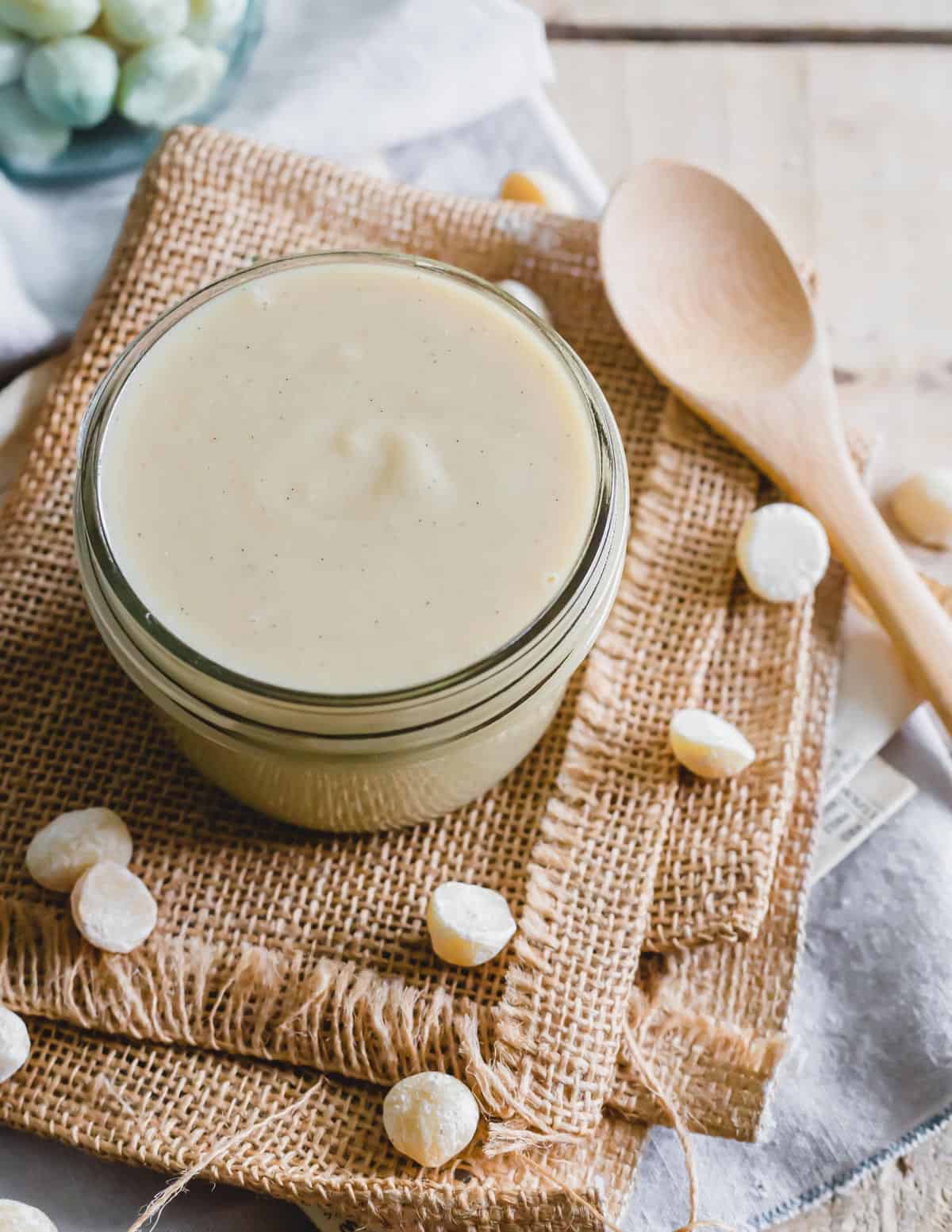 Macadamia nut butter in a glass jar.