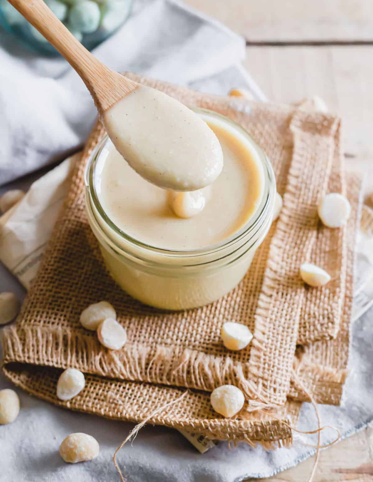Spoonful of creamy macadamia nut butter.