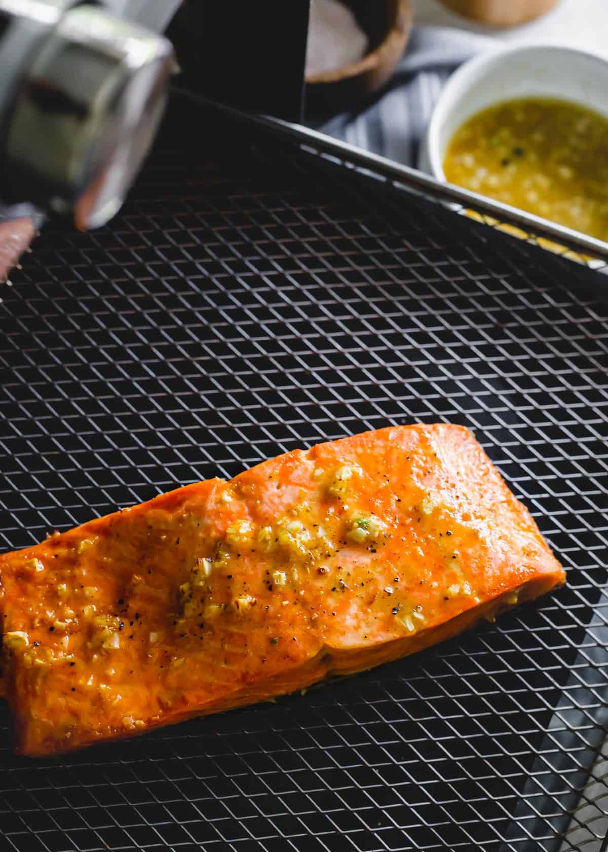 Air fried frozen salmon filet with maple mustard garlic sauce.