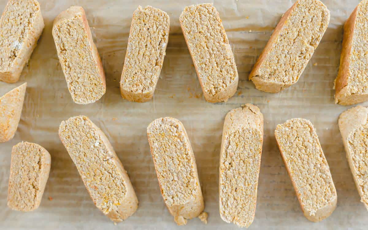 Easy pumpkin biscotti recipe on a parchment lined baking sheet.