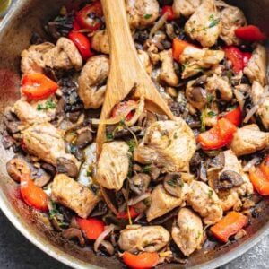 Chicken bites with garlic, mushrooms, red peppers and onion.