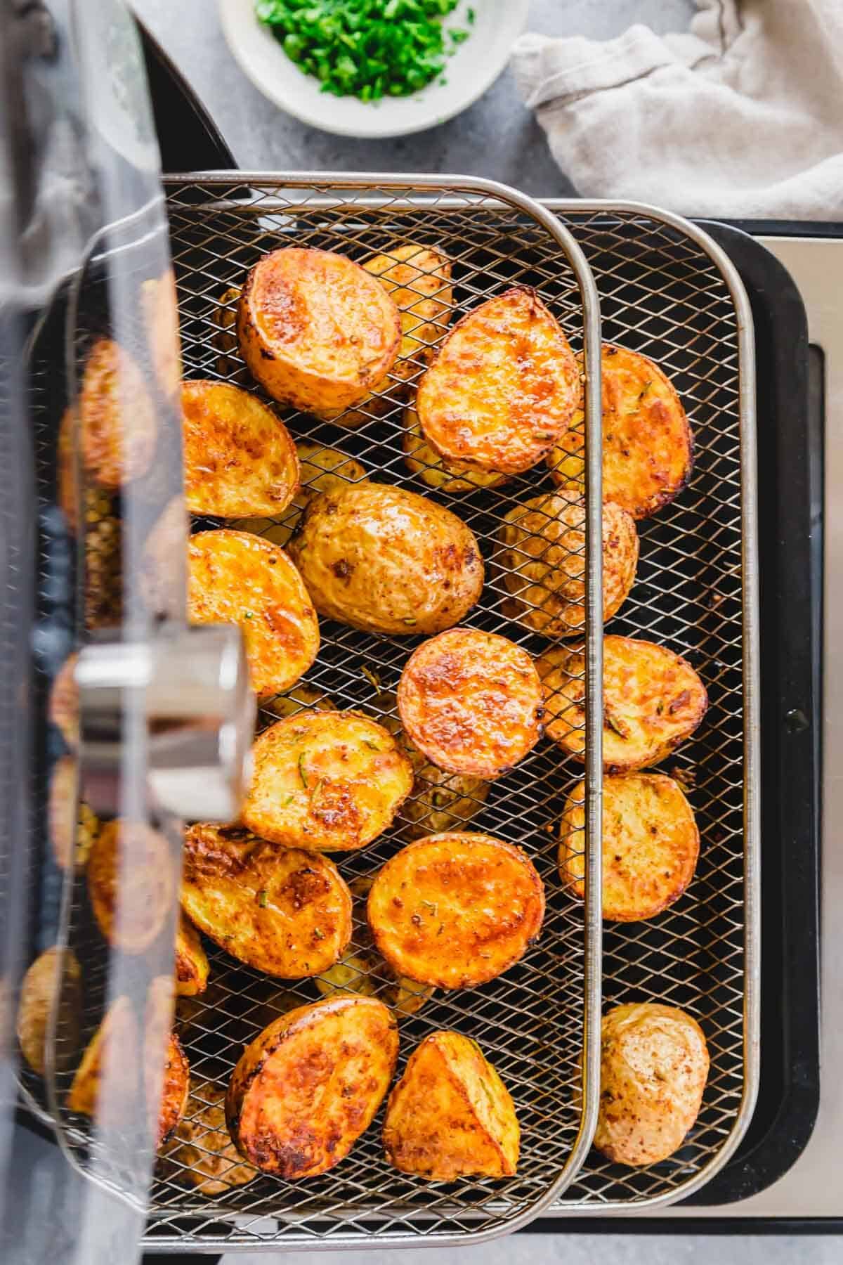 Baby potatoes cut in half and roasted in an air fryer.