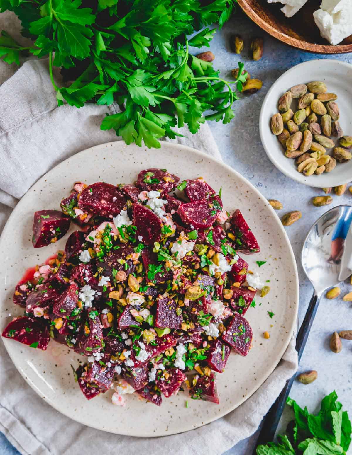 Beet salad with feta cheese on a serving plate.