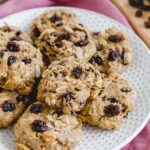Vegan oatmeal raisin cookies on a plate.