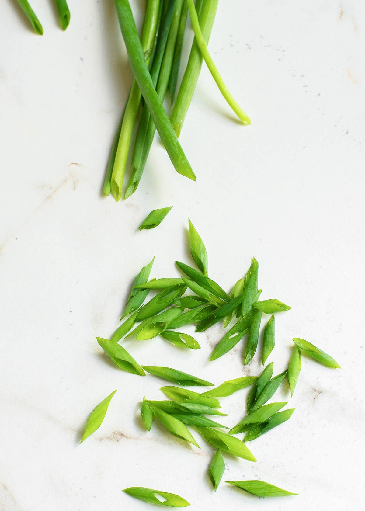 Green onions cut on the bias.