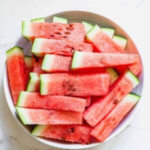 Watermelon sticks in a bowl.