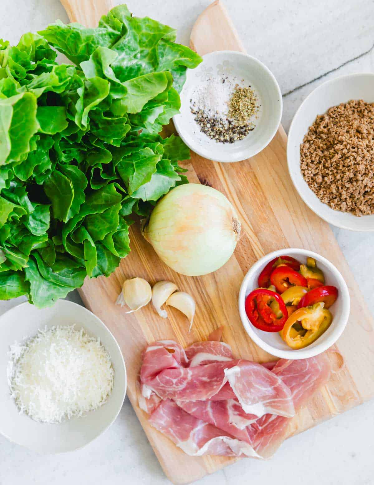 Ingredients Utica greens on a cutting board.