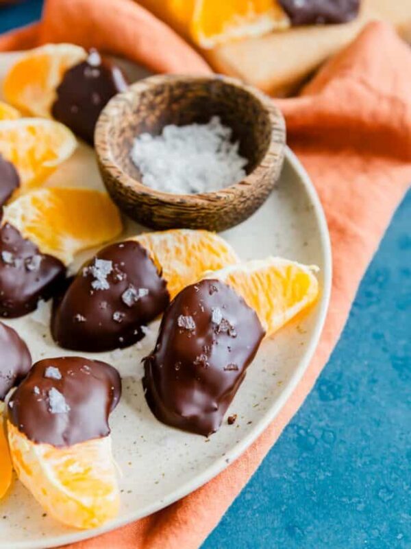 Chocolate oranges with sea salt on a plate.