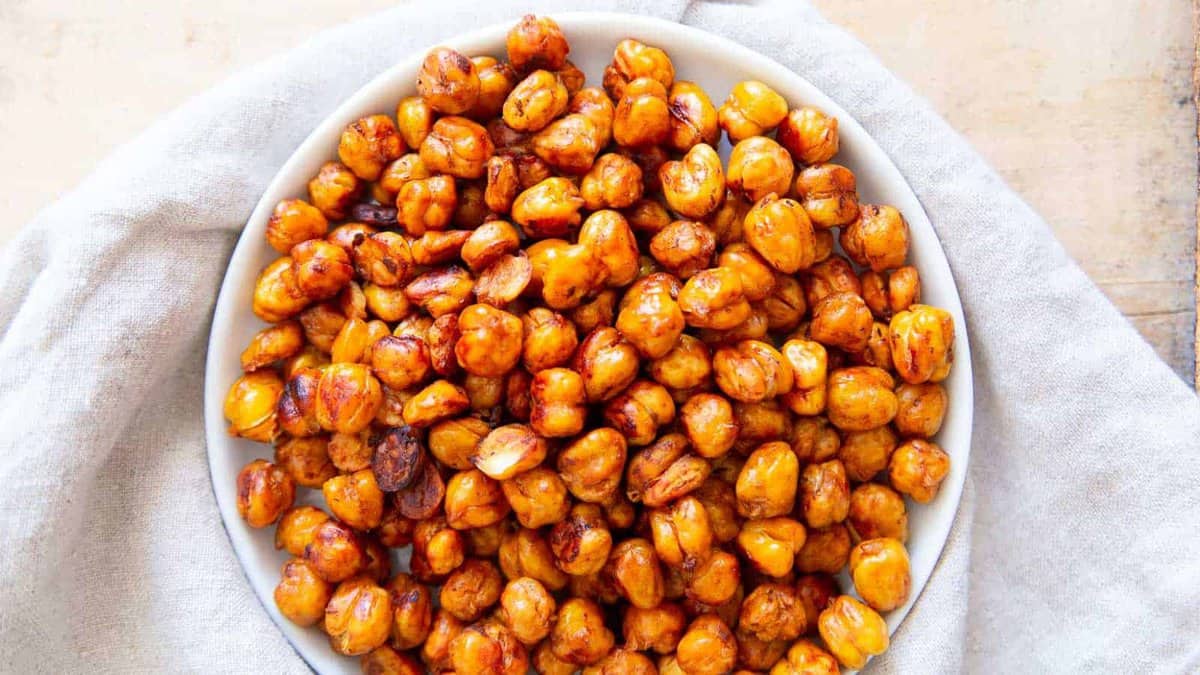 BBQ roasted chickpeas on a white plate.