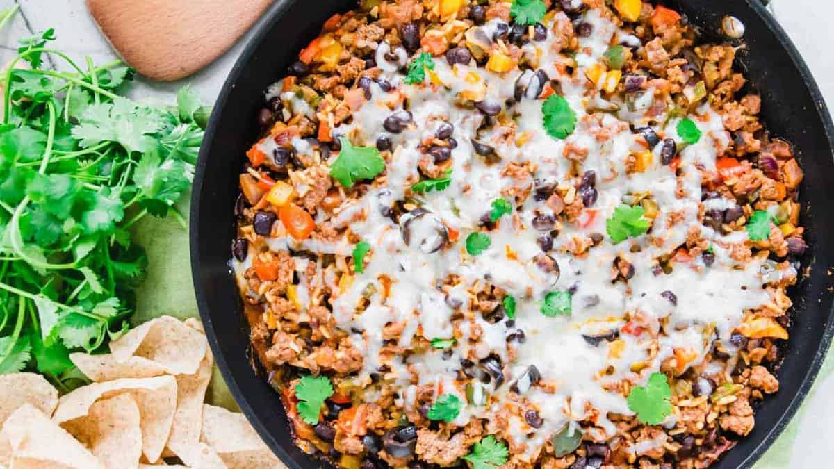 Mexican ground beef skillet recipe with melted cheese.