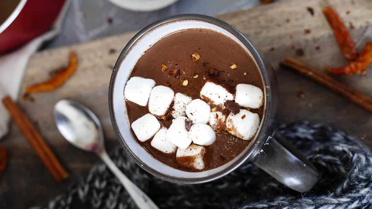 Spicy Mexican hot choclate in a mug with mini marshmallows.