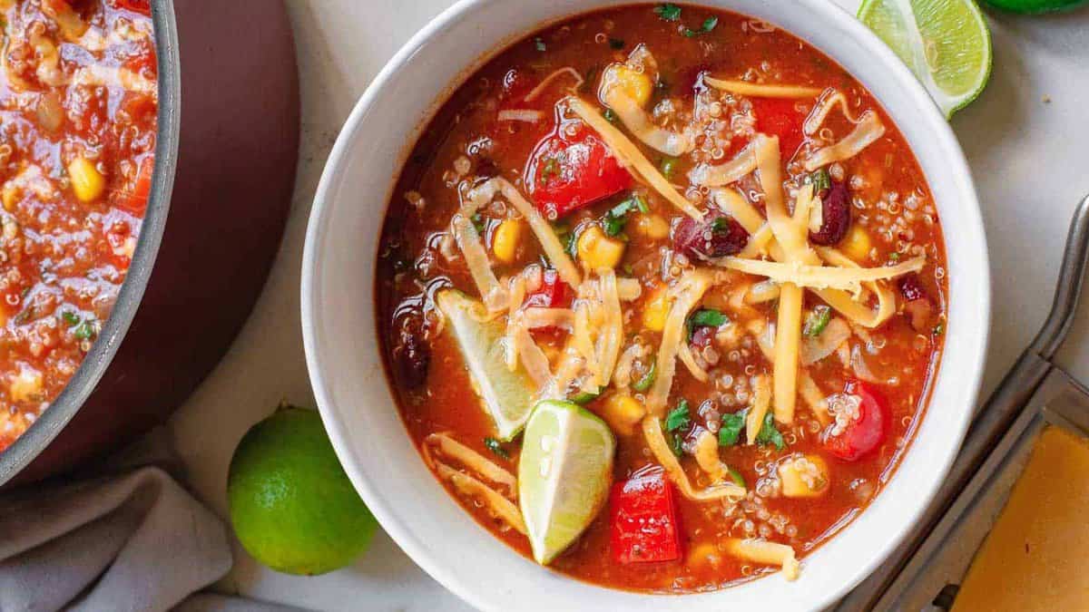 Mexican vegetable soup with quinoa in a bowl.
