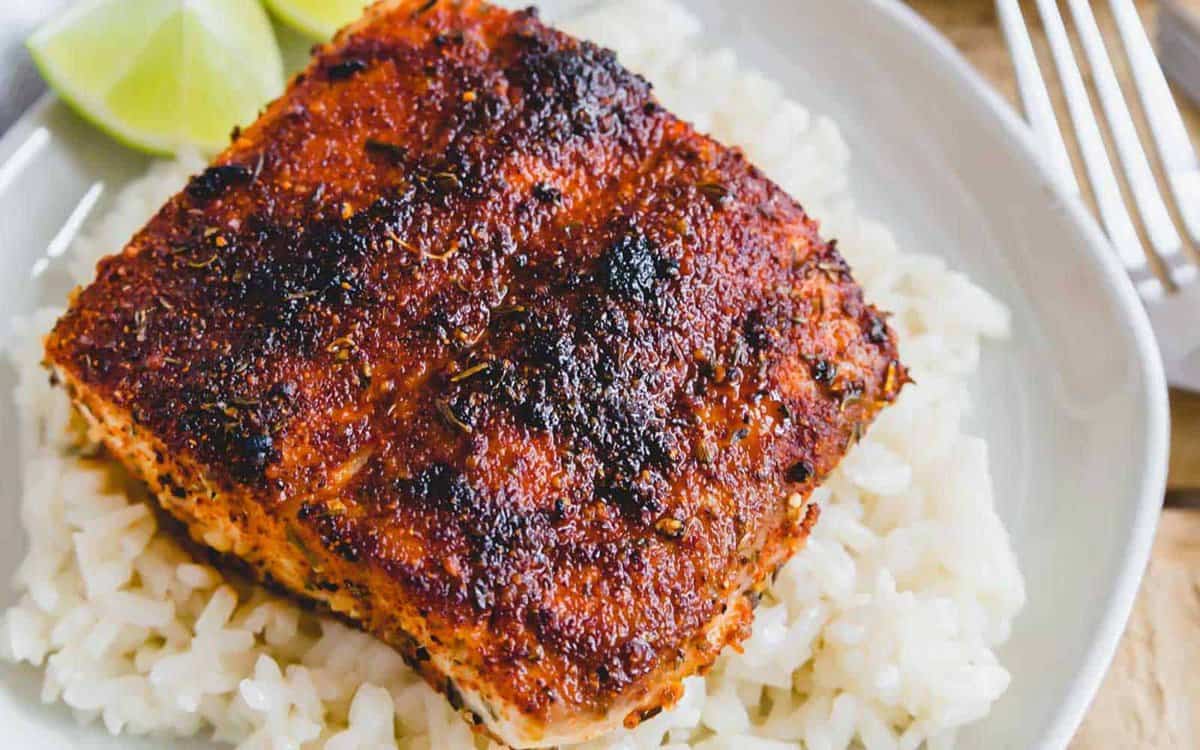 Blackened mahi mahi over white rice.