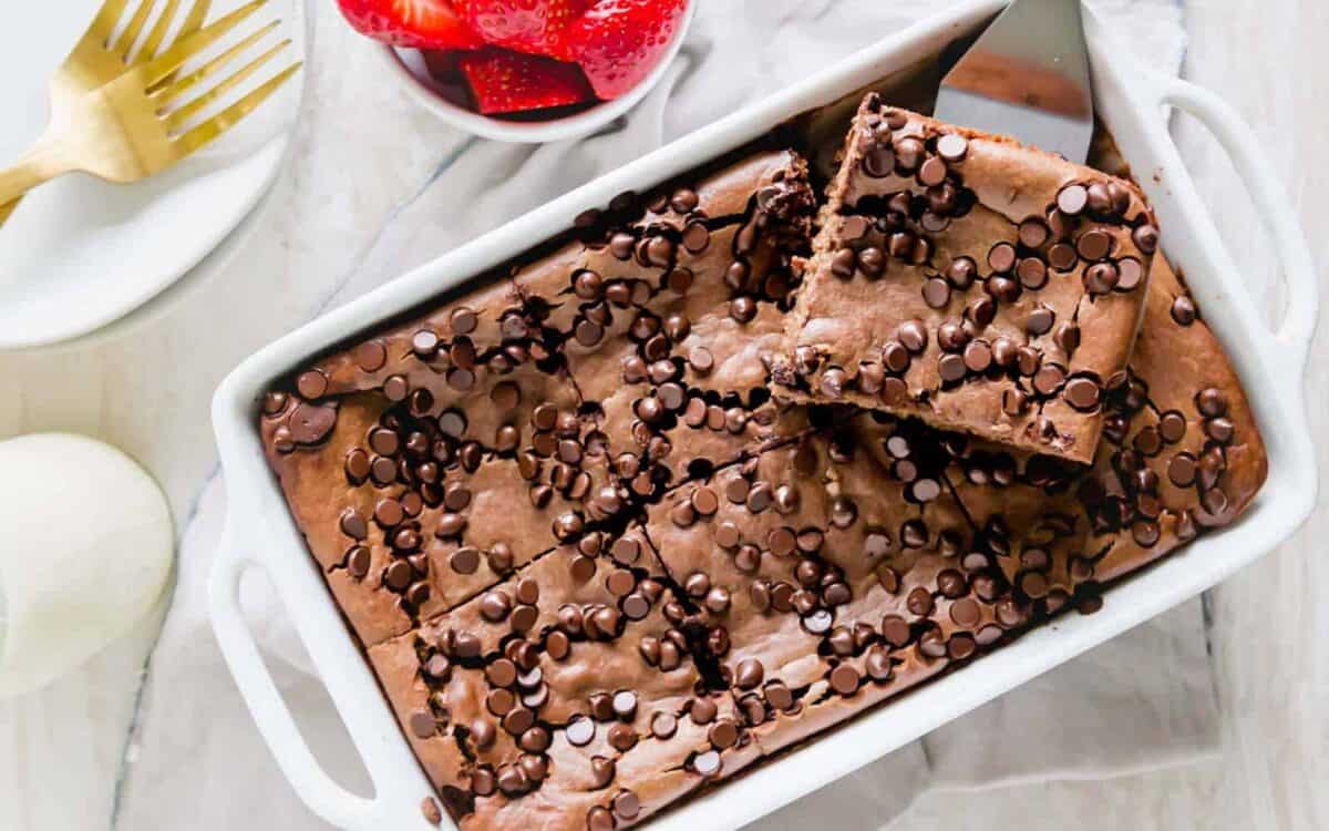 Chocolate baked oats in a white baking dish.