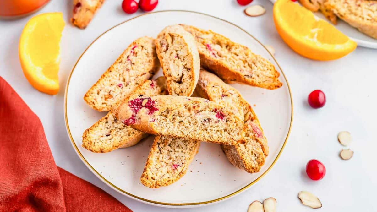 Cranberry orange biscotti on a plate.