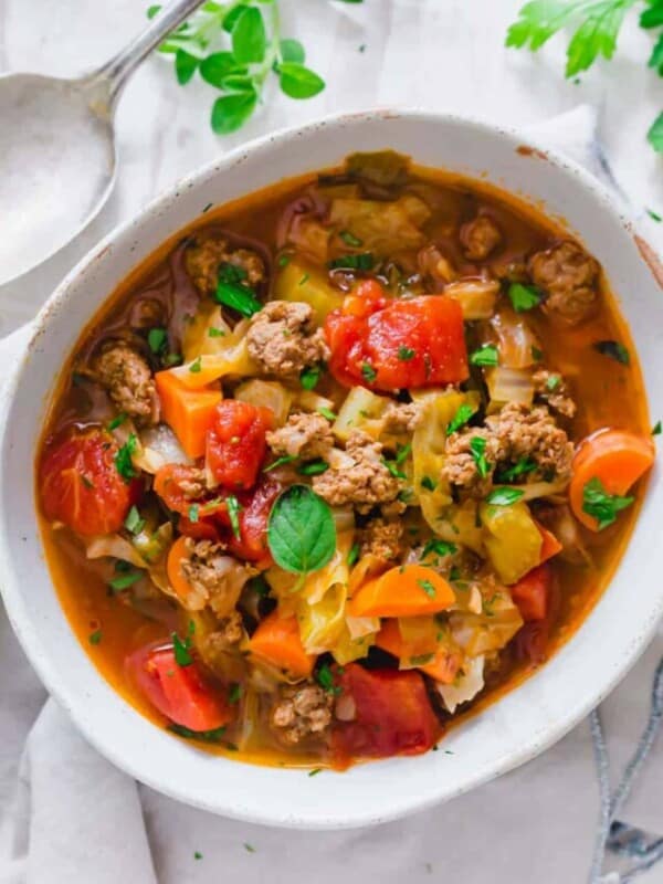 A bowl of stew with meat and vegetables.