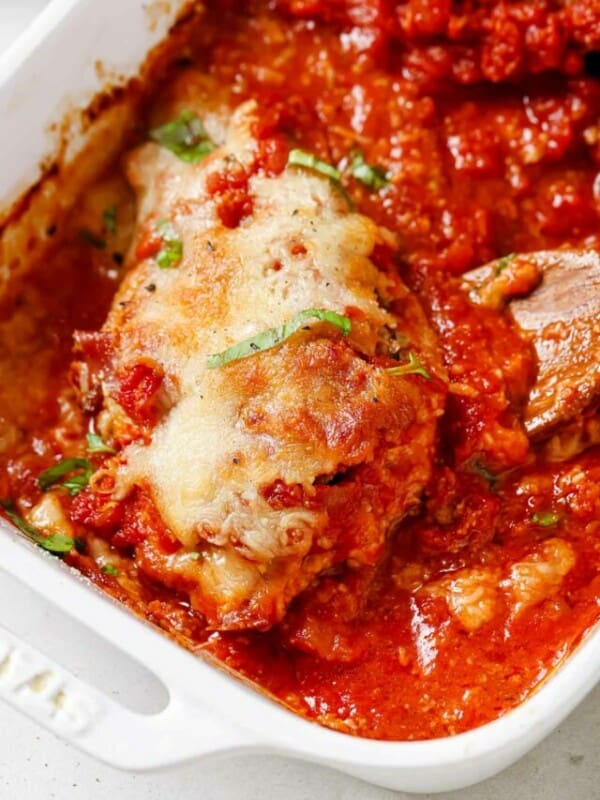 A casserole dish filled with meatballs and sauce.