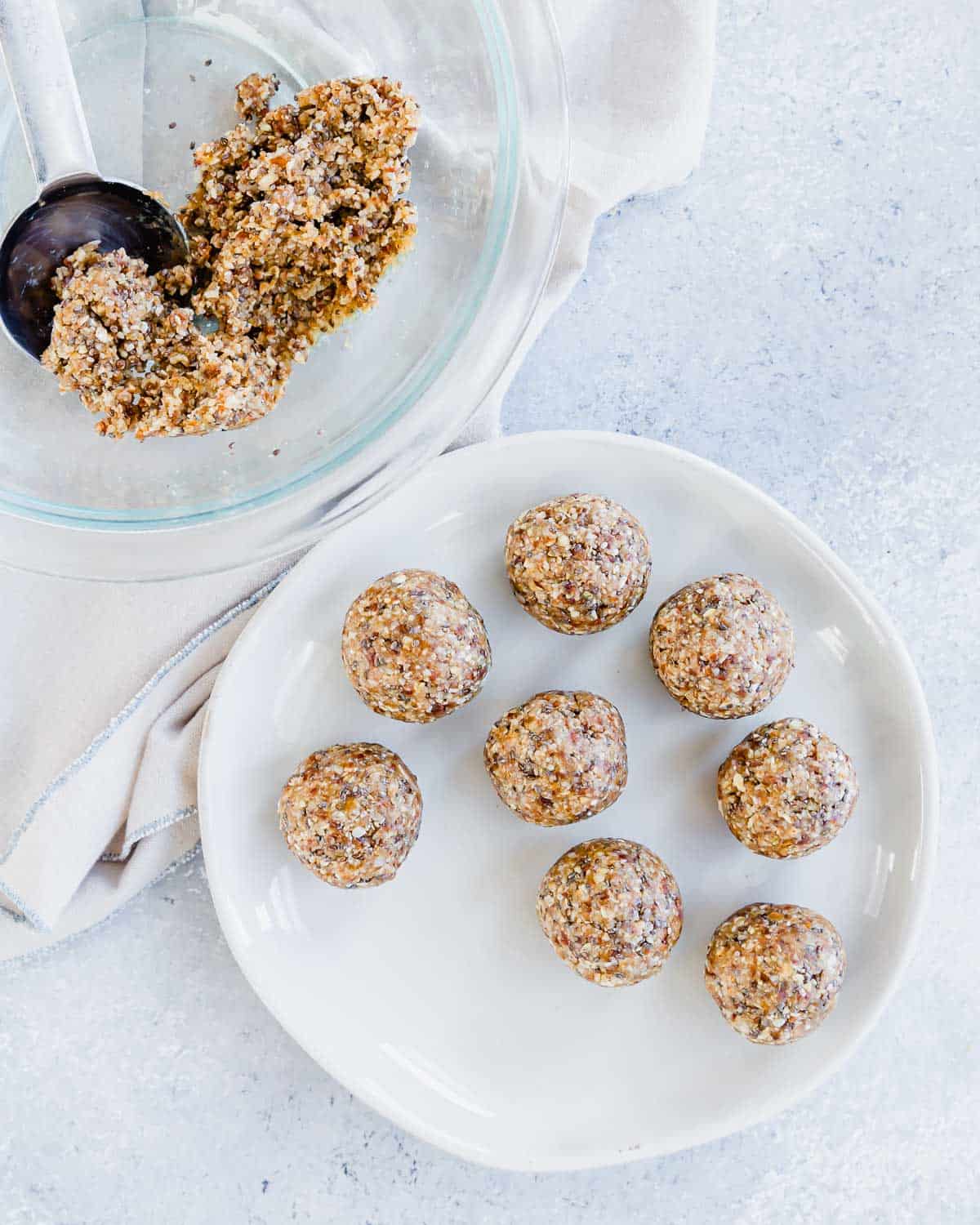 A plate full of oat and date balls.