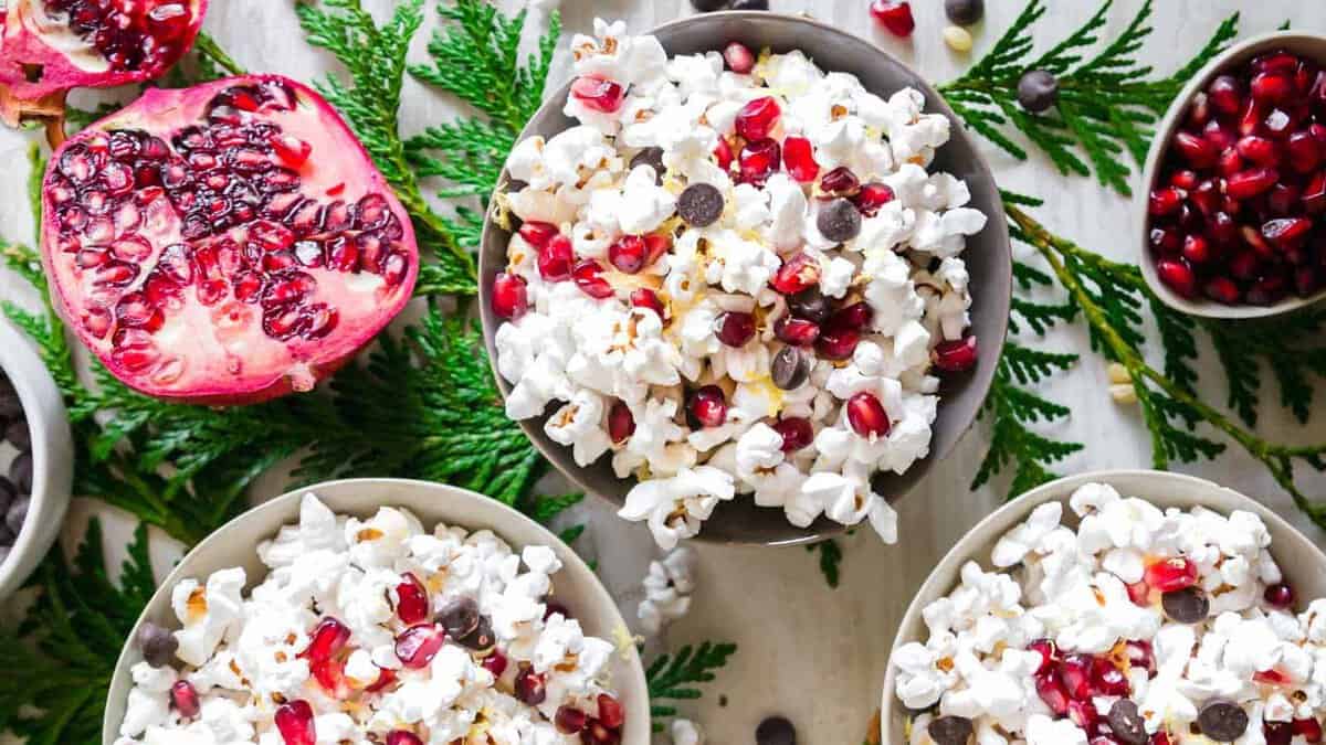 Pomegranate popcorn with chocolate chips and pomegranate seeds.