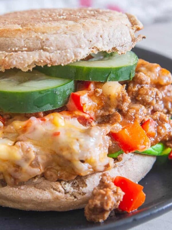 Sloppy Joes on an English muffin on a plate.