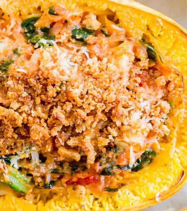 Spaghetti squash stuffed with spinach and cheese.