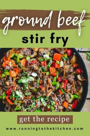 Ground beef stir fry with vegetables in a skillet.