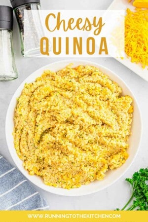Cheesy quinoa in a white bowl with text overlay that says "cheesy quinoa'.