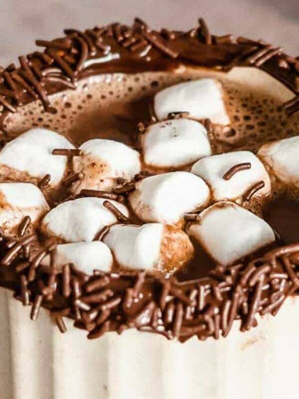 Hot chocolate with marshmallows in a mug.