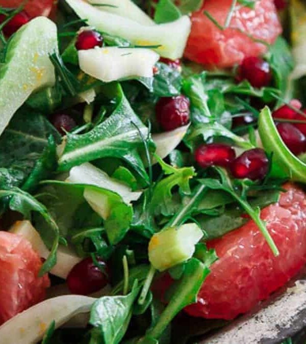 A salad with grapefruit, arugula and fennel.