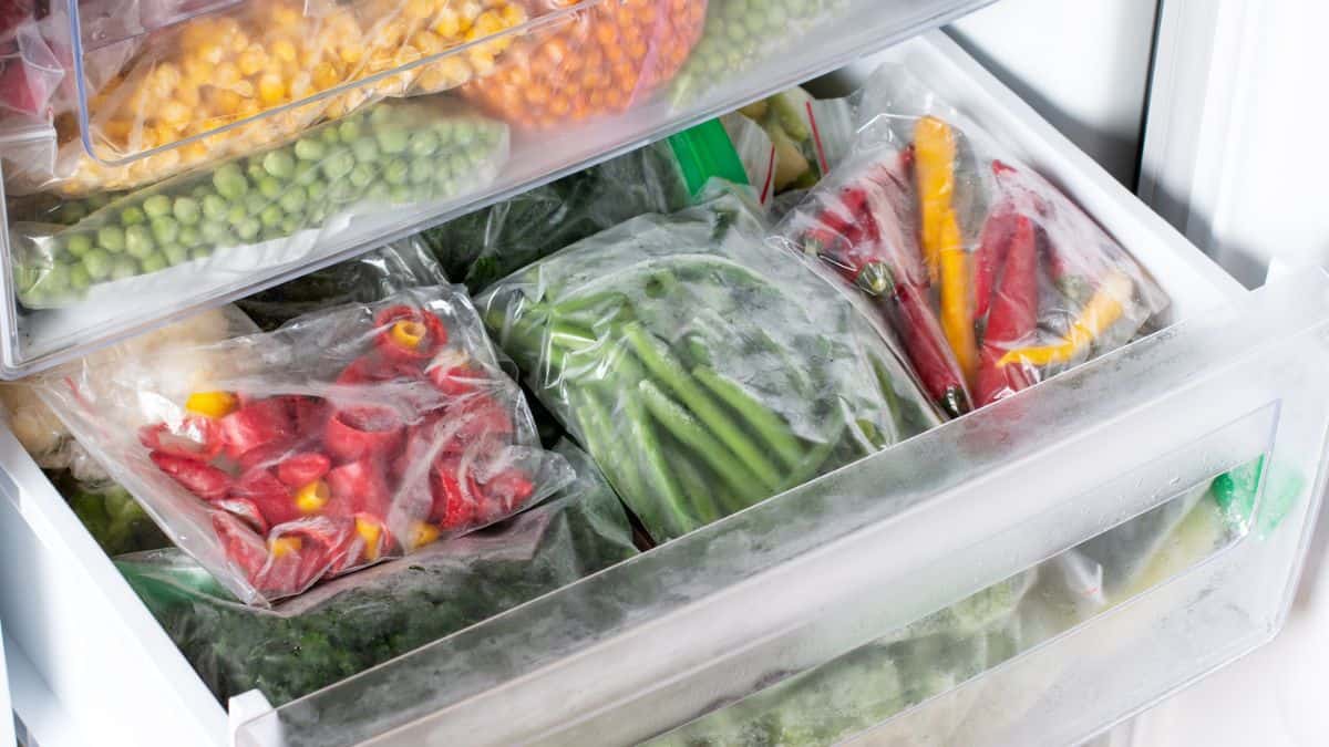 A freezer full of vegetables.