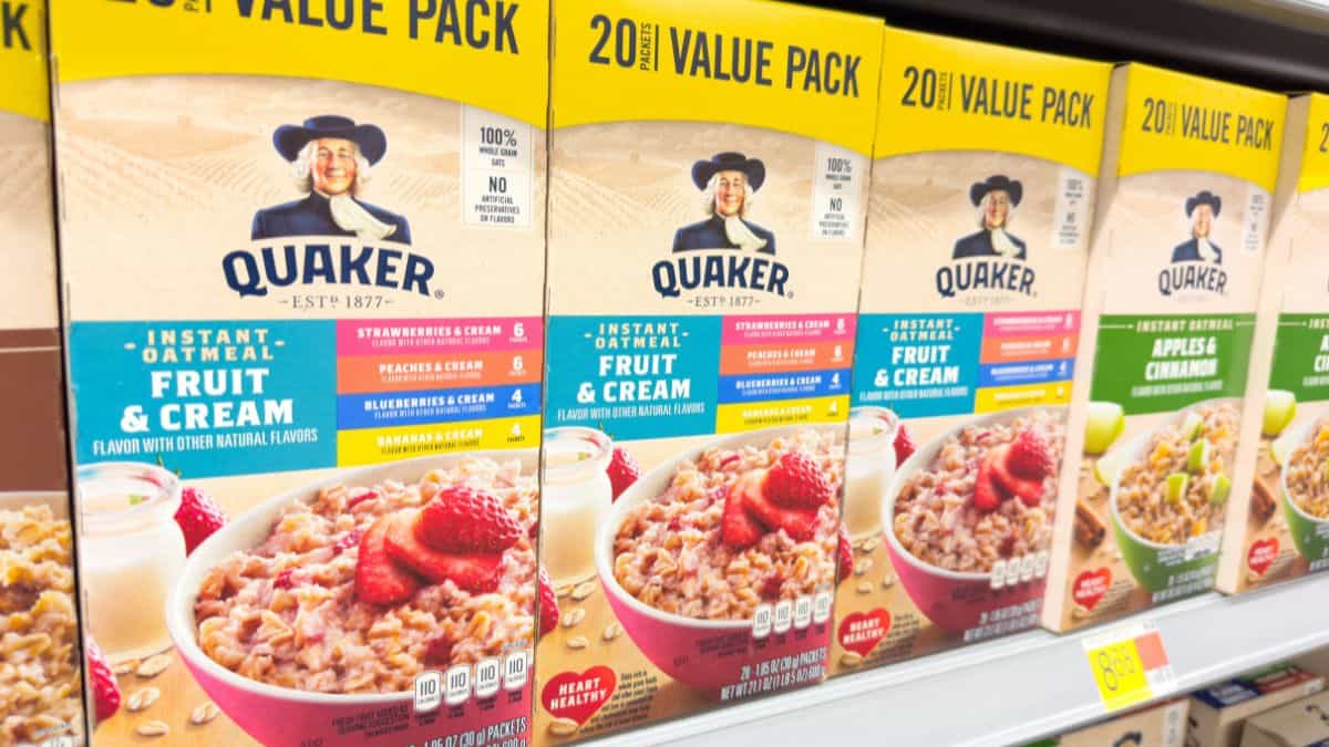 Boxes of quaker instant oatmeal on supermarket shelves.