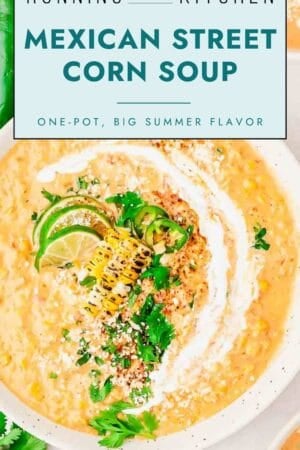 A bowl of Mexican street corn soup garnished with grilled corn, lime slices, and cilantro. Text overlay reads "Mexican Street Corn Soup—One-pot, Big Summer Flavor.