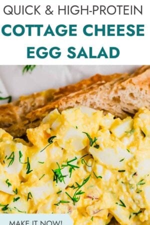 Close-up of creamy cottage cheese egg salad with chopped herbs on a slice of bread, featured under the text “QUICK & HIGH-PROTEIN COTTAGE CHEESE EGG SALAD.”.